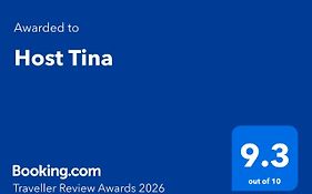 Host Tina